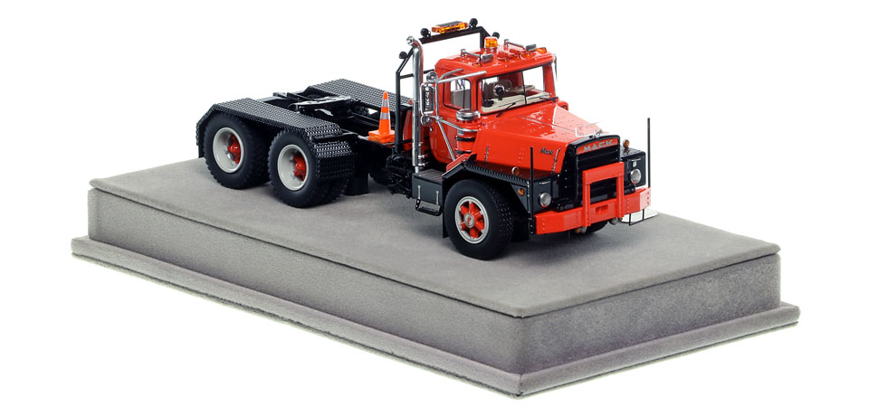 Mack DM 800 tandem axle tractor scale model in red over black is hand-crafted and intricately detailed.