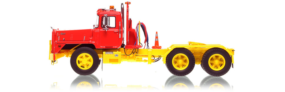 1:50 scale model of Mack DM 800 tandem axle tractor in red over yellow